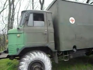 news ukraine 14 04 2014 military equipment in ilovaisk kuteynikovo. shooting. 15 04 2014 a serviceman of the ukrainian army, driving a gaz-66 car, drove into the village of kuteynikovo at high speed, rammed people who organized a human chain protesting against possible hostilities at full speed, miraculously managed to avoid casualties, then opened fire in the village. during the conversation, local residents tried to find out what caused the aggressive behavior of the servicemen, what